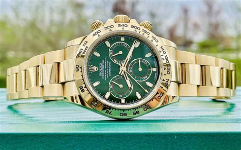 gold green dial rolex